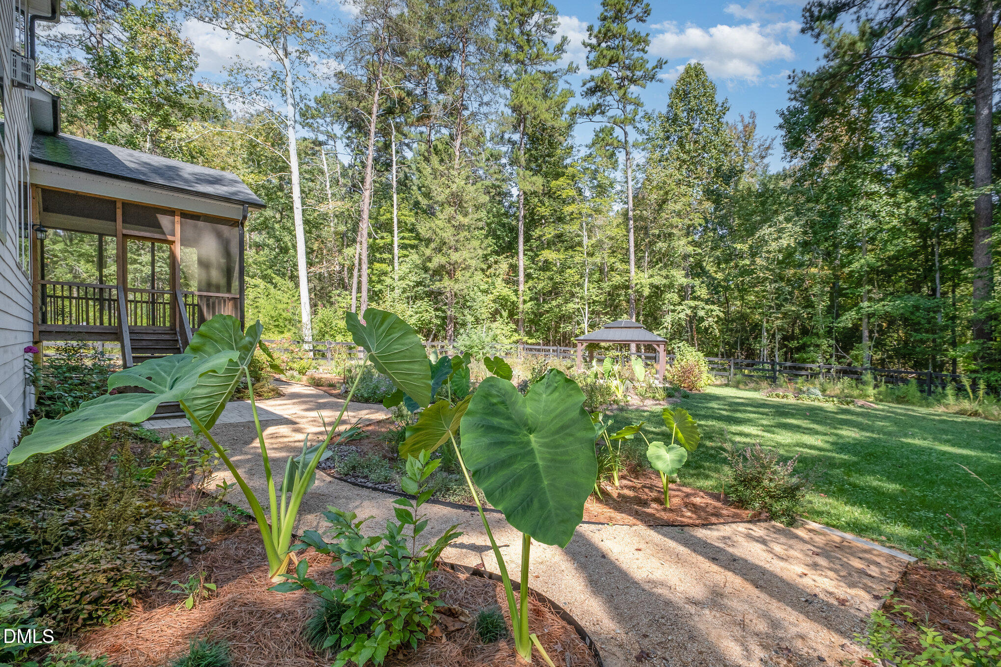 1017 Fortune Lane Mebane, NC 27302 - Photo 70 of 84 a garden with trees in front of it