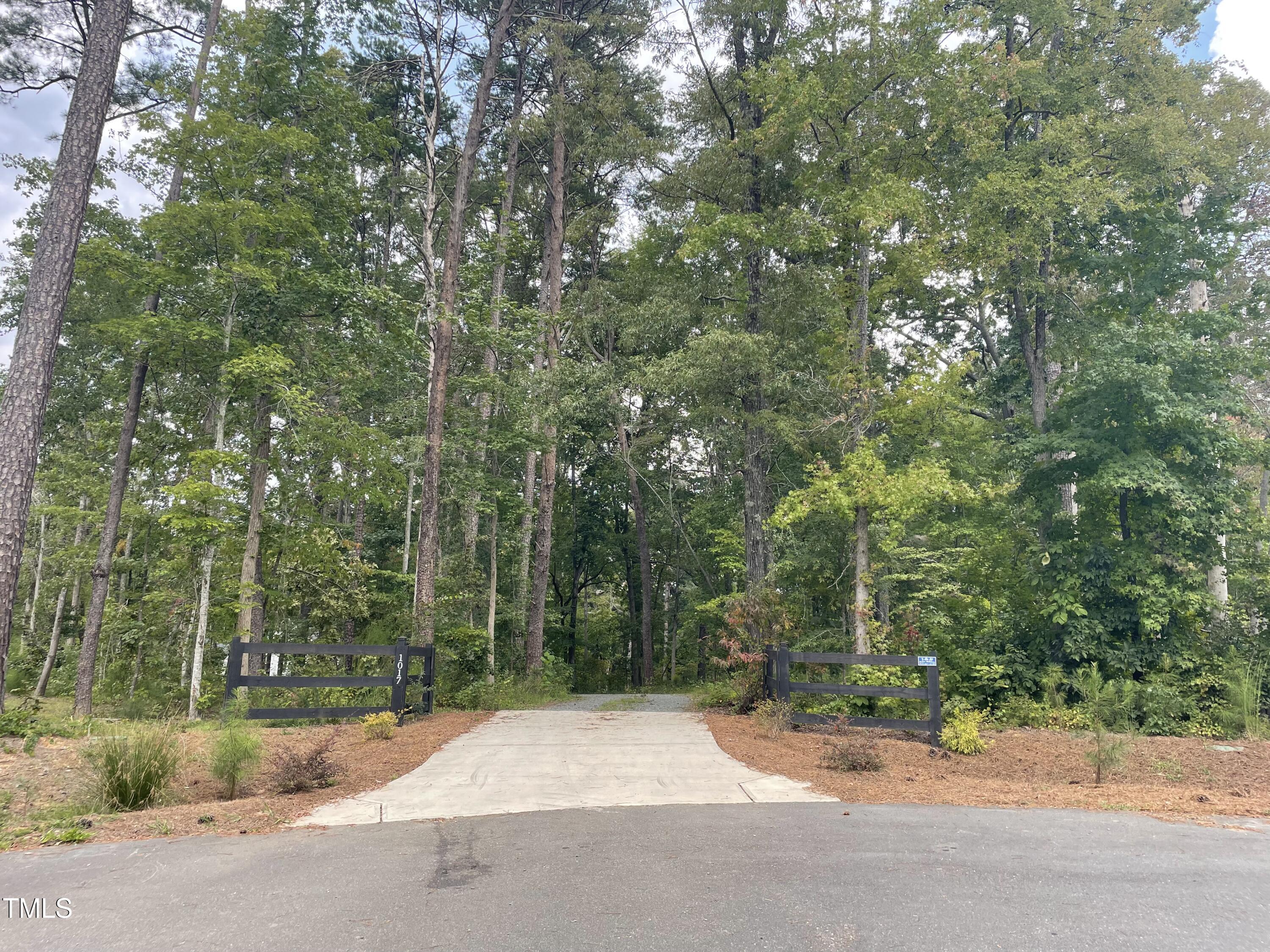 1017 Fortune Lane Mebane, NC 27302 - Photo 80 of 84 a view of a road with a trees
