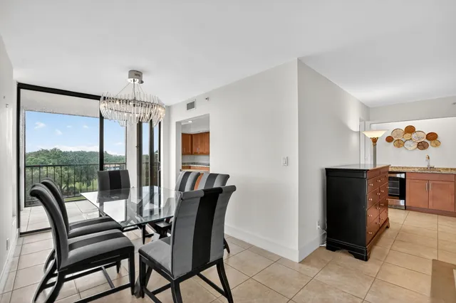 a view of a balcony with potted plants