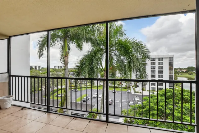 a kitchen with granite countertop a stove top oven and sink