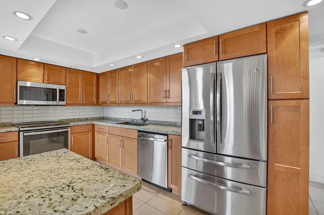 a bedroom with a bed and a walk in closet