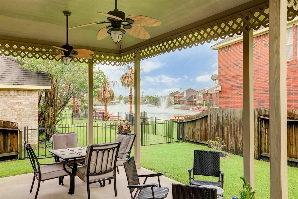10147 Lazy Lagoon Houston, TX 77065 - Photo 8 of 15 a view of a dining room with furniture window and outside view