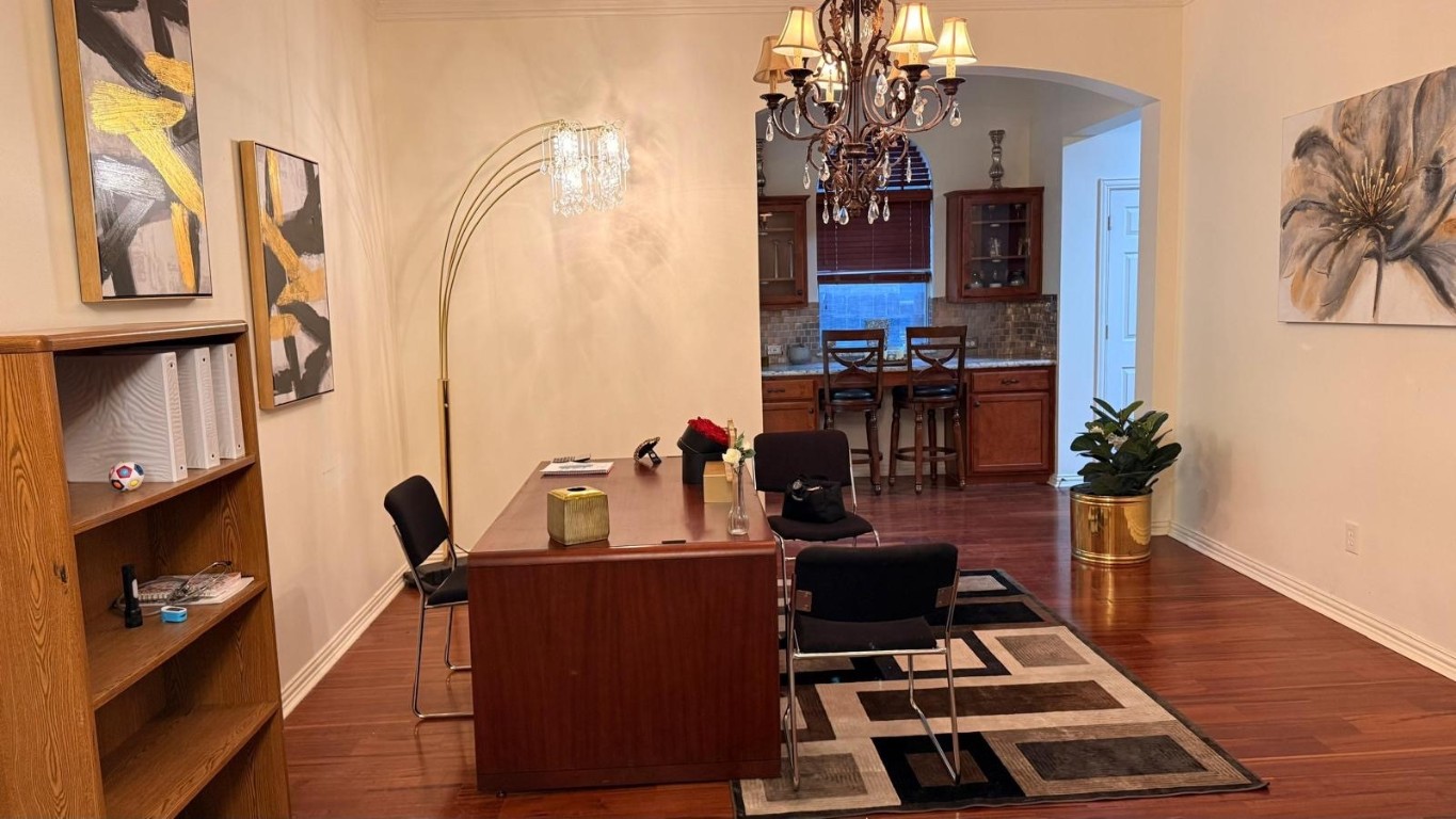 10147 Lazy Lagoon Houston, TX 77065 - Photo 9 of 15 a room with furniture and a potted plant