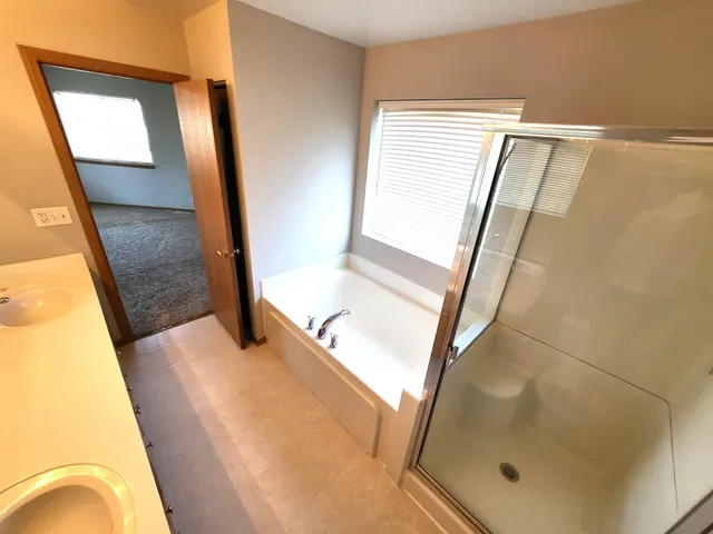 a view of balcony with furniture