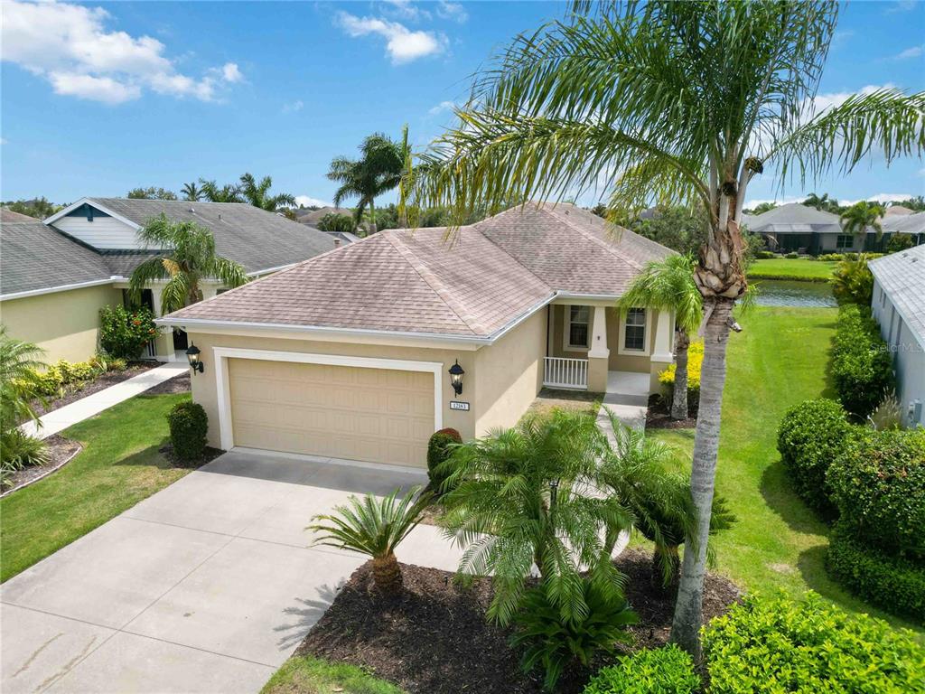 12183 Longview Lake Circle Bradenton, FL 34211 - Photo 1 of 1 a front view of house with yard and green space