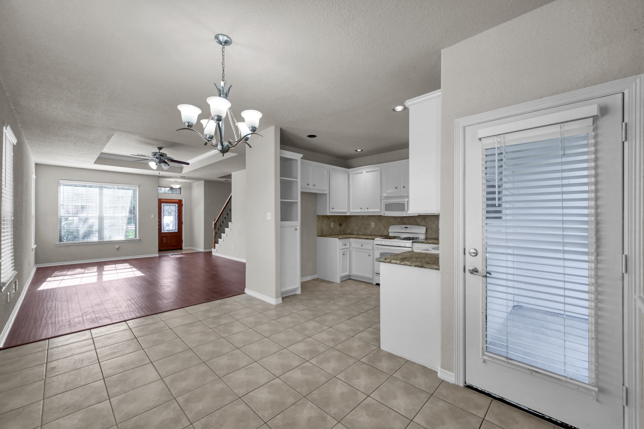 130 April Cove Conroe, TX 77356 - Photo 12 of 36 a view of a kitchen with a sink and cabinets