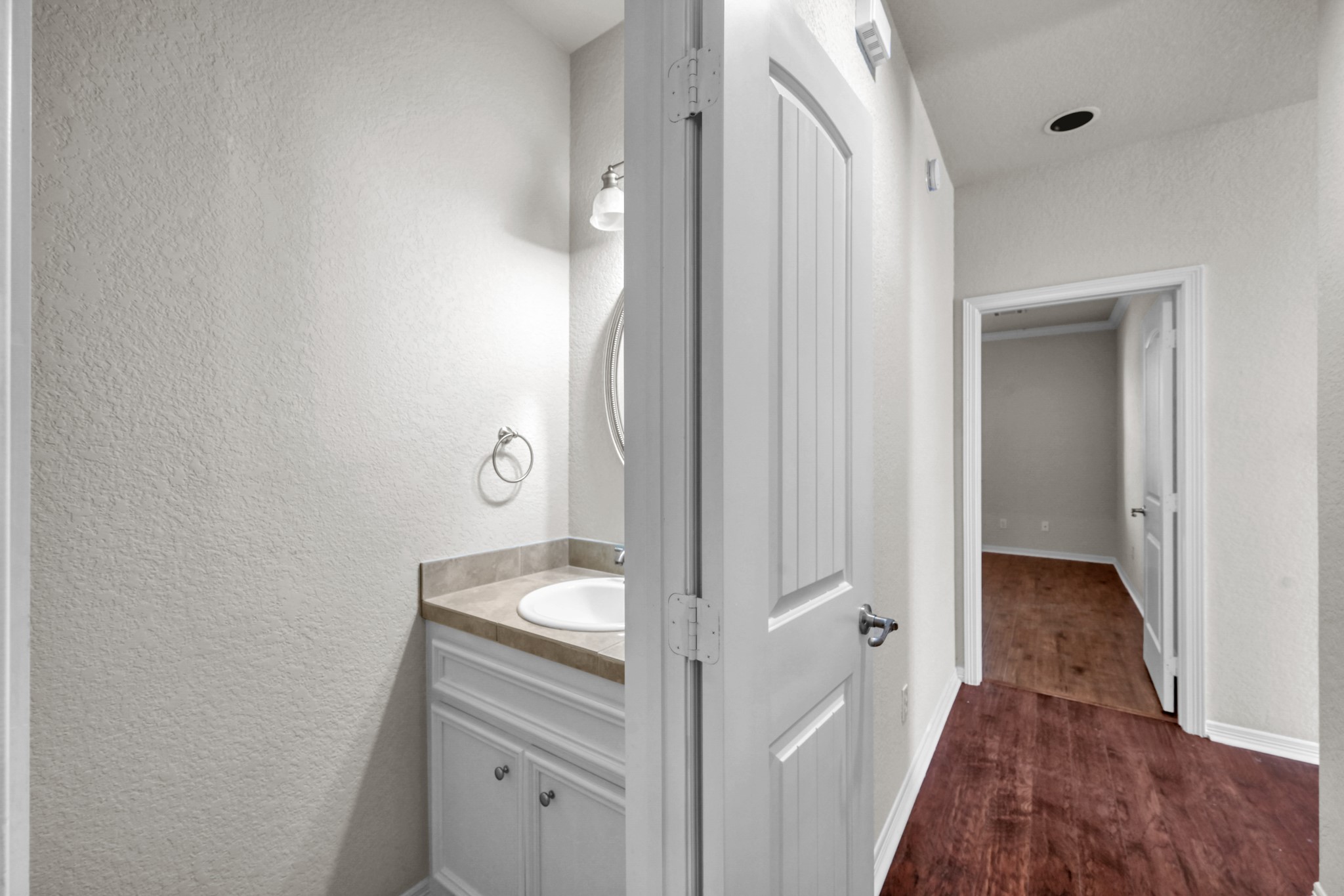 130 April Cove Conroe, TX 77356 - Photo 18 of 36 a bathroom with a sink and a mirror