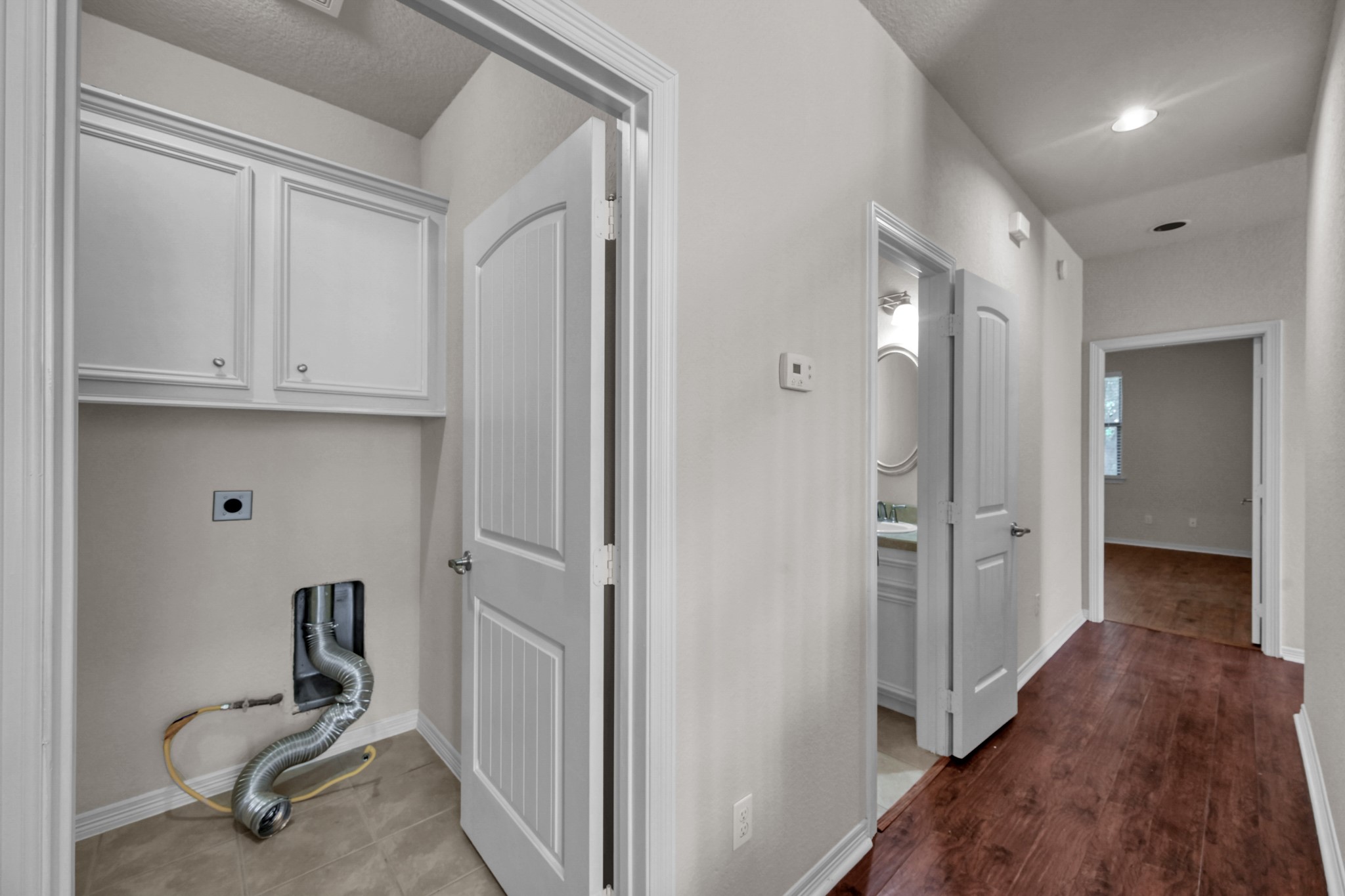 130 April Cove Conroe, TX 77356 - Photo 26 of 36 a view of a workspace with wooden floor