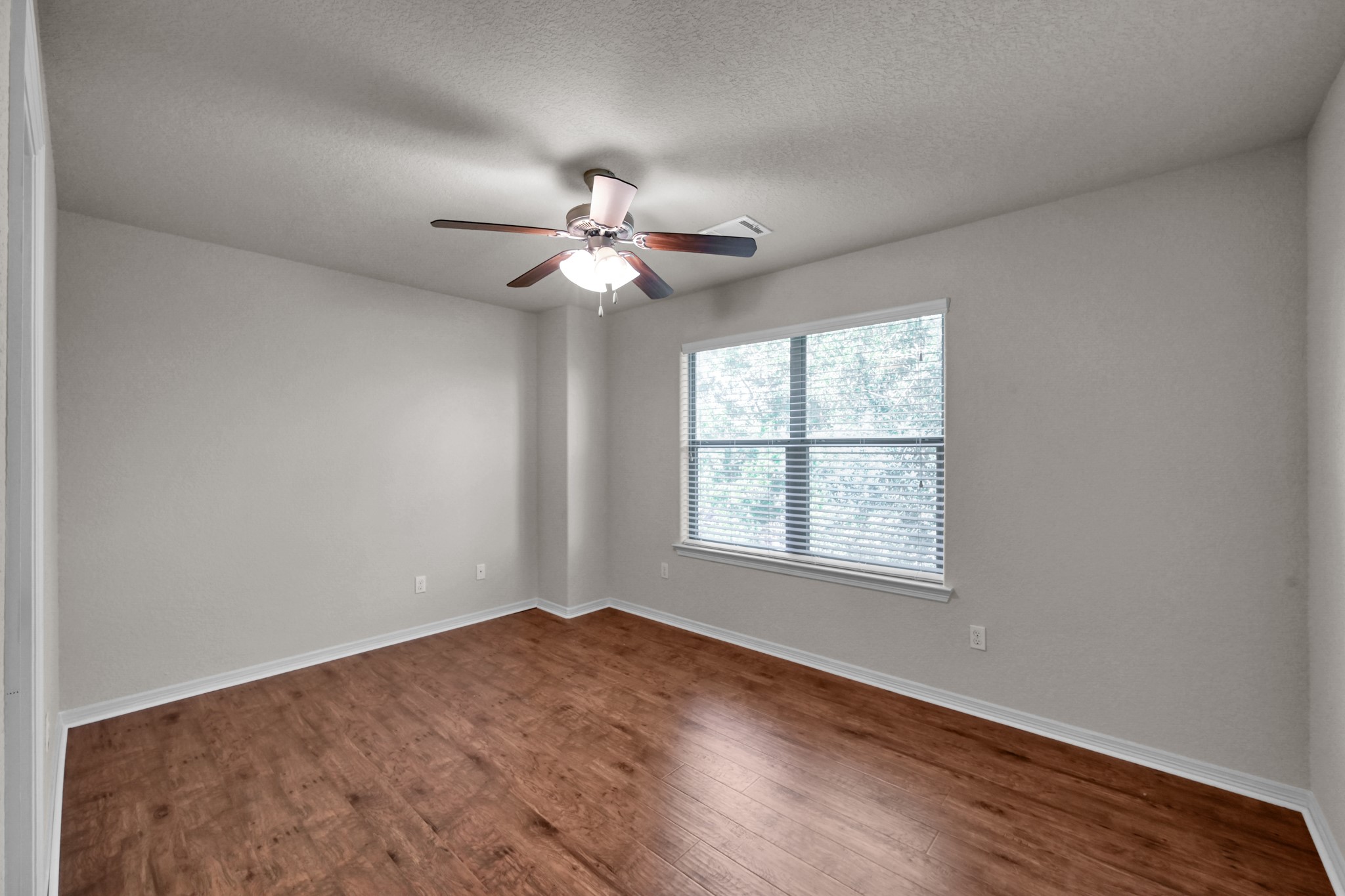 130 April Cove Conroe, TX 77356 - Photo 27 of 36 a view of an empty room with a window
