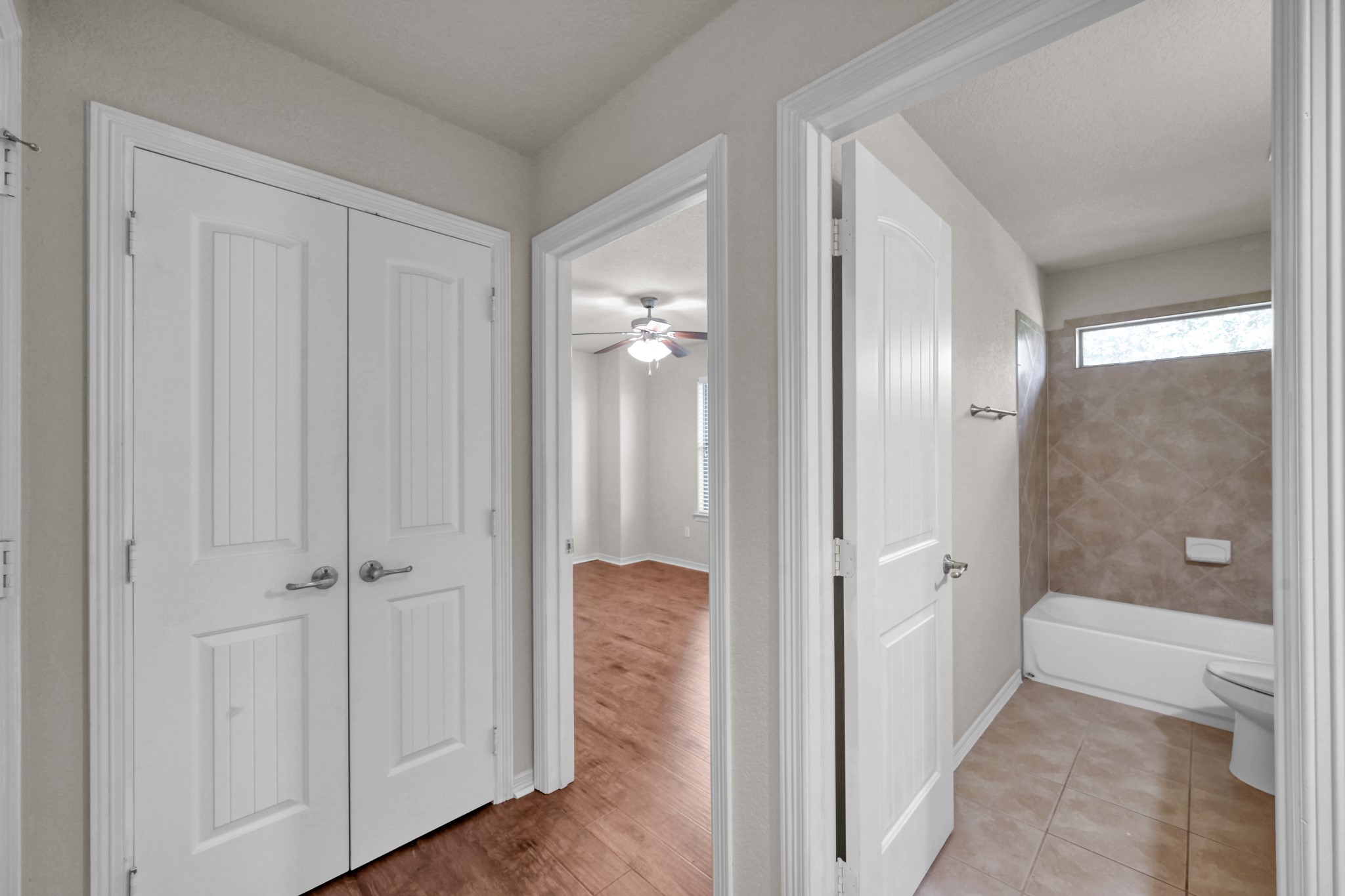 130 April Cove Conroe, TX 77356 - Photo 29 of 36 wooden view of a bathroom with a shower