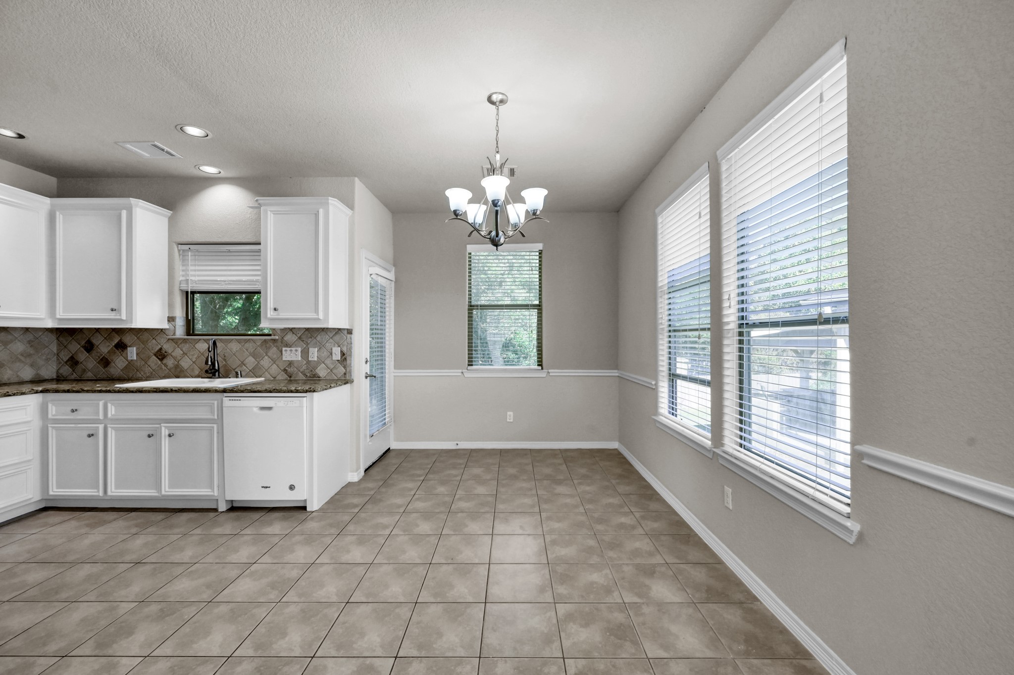 130 April Cove Conroe, TX 77356 - Photo 10 of 36 a large bathroom with a large tub shower and cabinets
