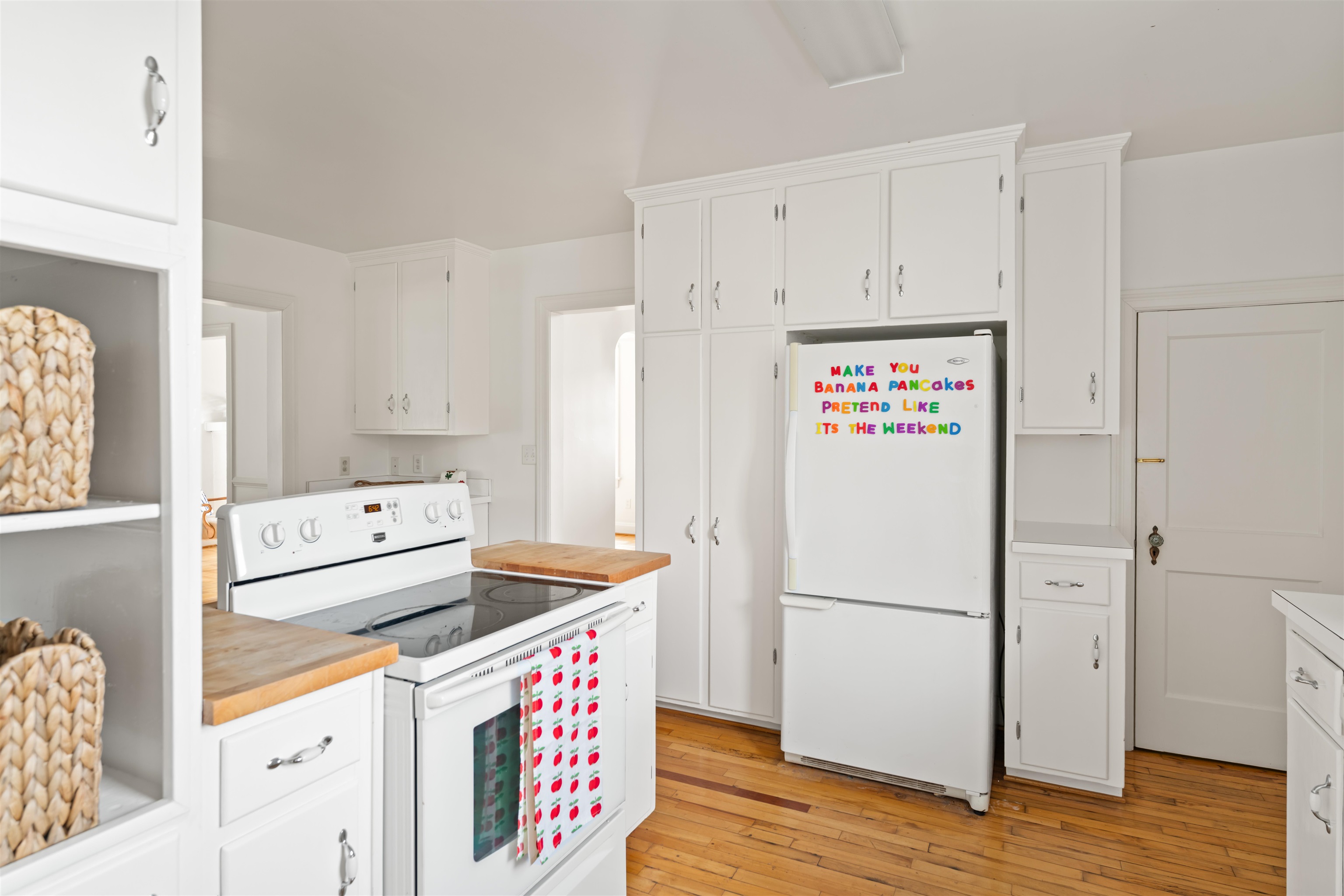 7 Taylor Street Staunton, VA 24401 - Photo 21 of 47 a kitchen with stainless steel appliances a refrigerator sink and wooden floor