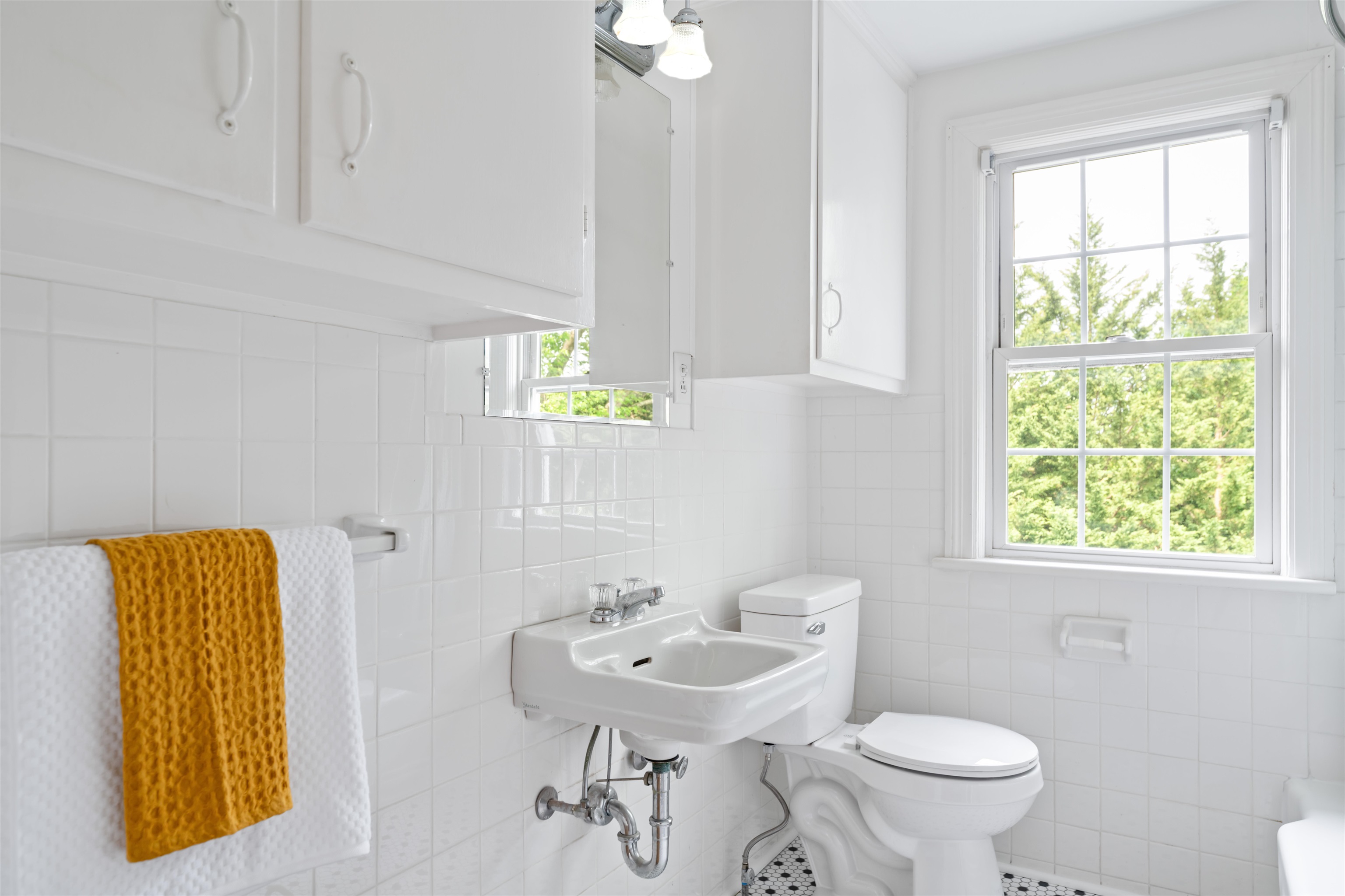 7 Taylor Street Staunton, VA 24401 - Photo 33 of 47 a bathroom with a sink toilet and a mirror