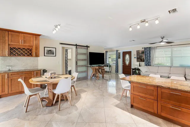 a view of a dining room with furniture