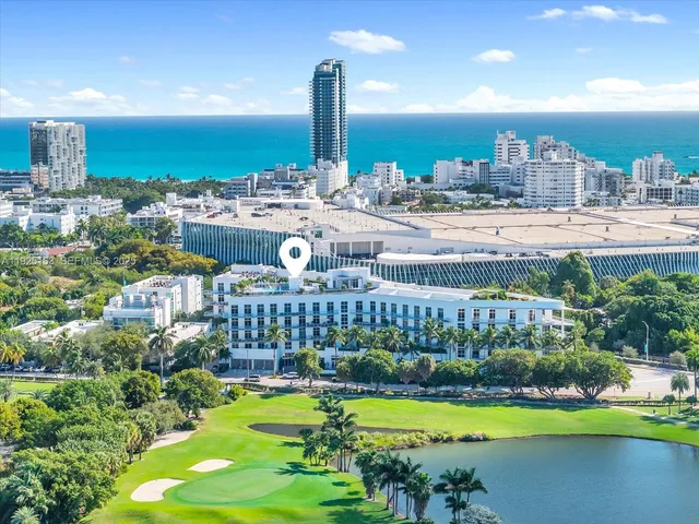 a view of a city with a lake