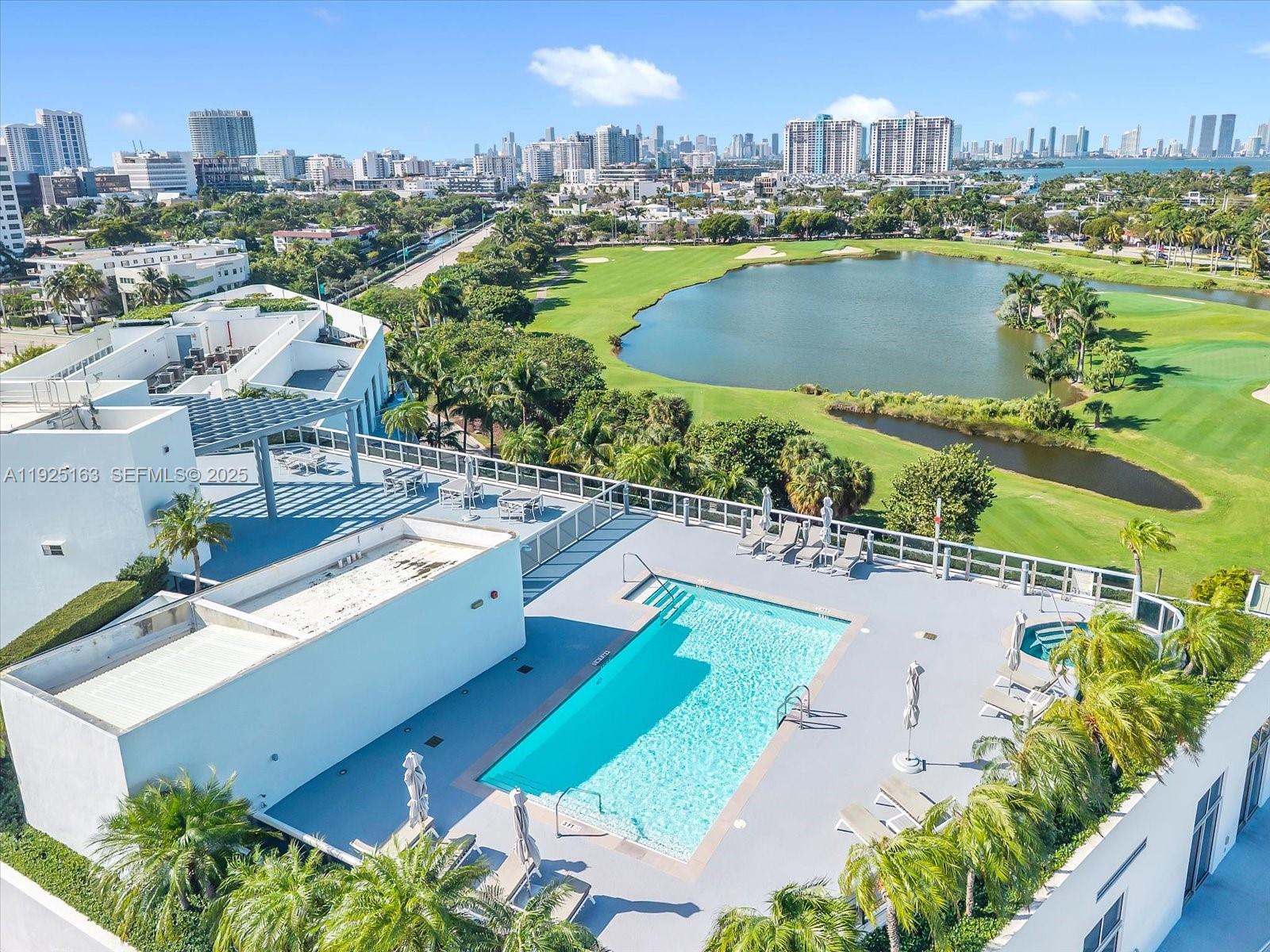 2001 Meridian Avenue, Unit 510 Miami Beach, FL 33139 - Photo 13 of 16 a view of a city with a lake