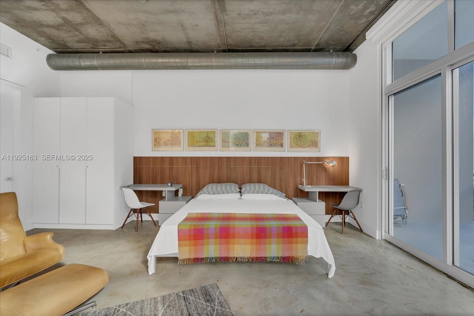 2001 Meridian Avenue, Unit 510 Miami Beach, FL 33139 - Photo 9 of 16 a room with furniture and a table