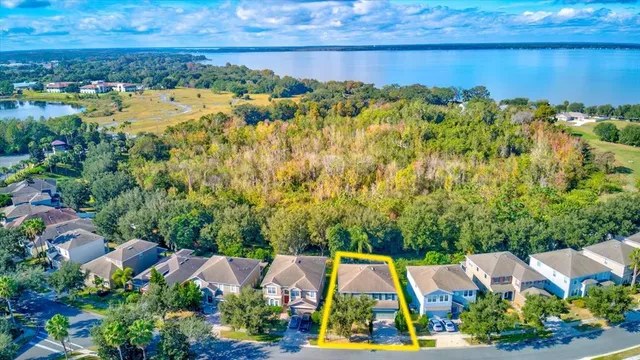 a view of lake and houses with outdoor space