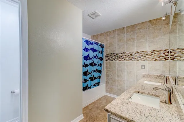 a view of a livingroom from a hallway