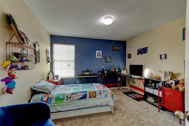 a bathroom with a tub and shower