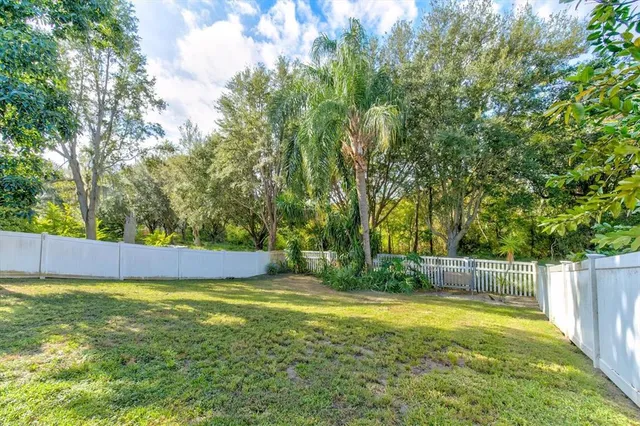 a house with trees in the background