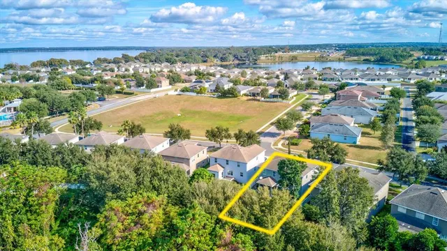 an aerial view of residential building with outdoor space