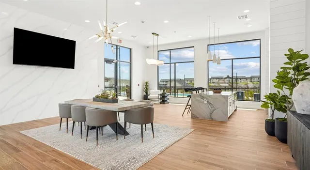 a living room with furniture fireplace and a flat screen tv