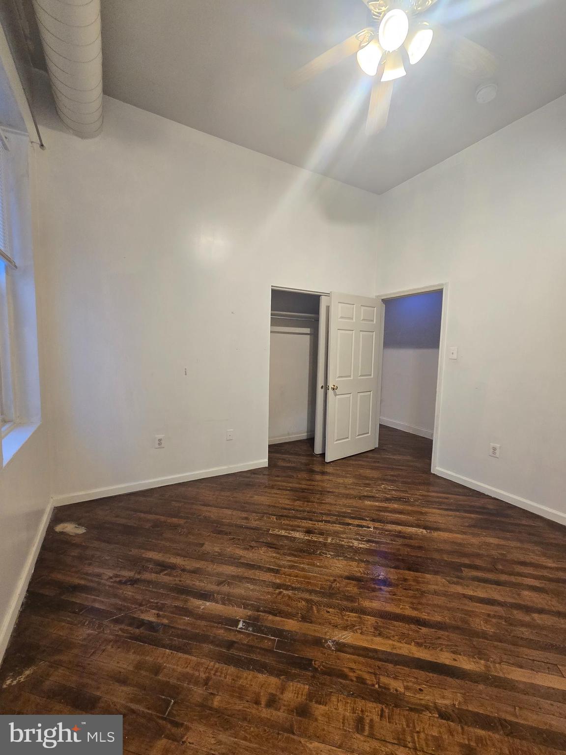 1304 Walnut Street, Unit 2 Philadelphia, PA 19107 - Photo 24 of 33 a view of empty room with wooden floor