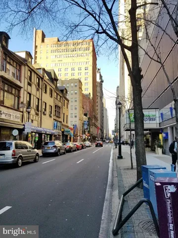 a view of a street with cars