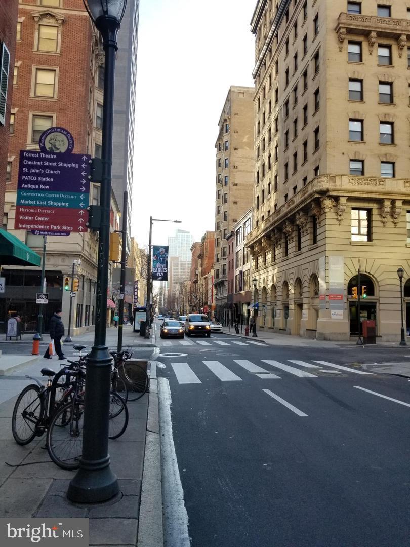1304 Walnut Street, Unit 2 Philadelphia, PA 19107 - Photo 4 of 33 a view of a street with cars