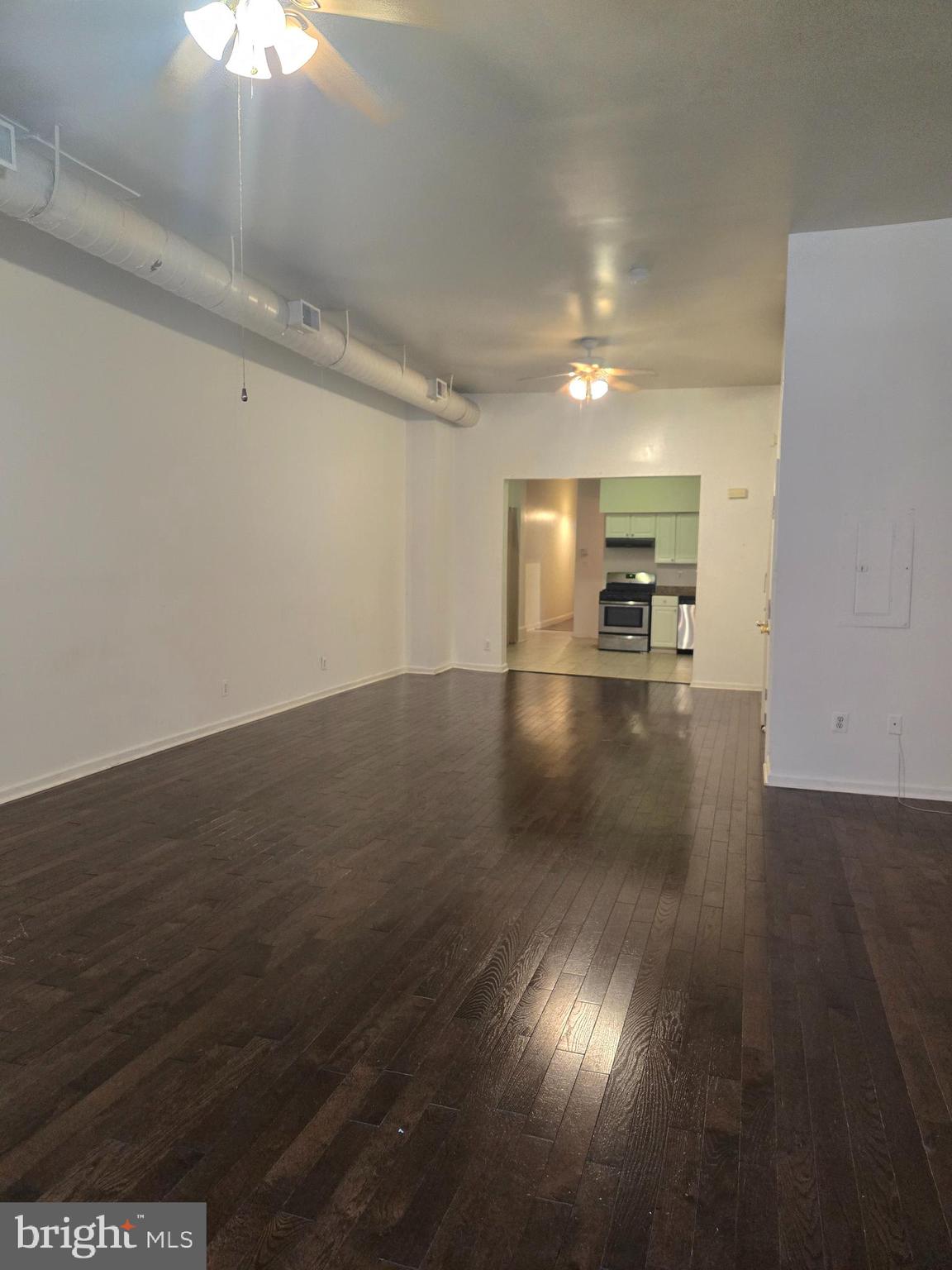 1304 Walnut Street, Unit 2 Philadelphia, PA 19107 - Photo 9 of 33 a view of empty room with wooden floor