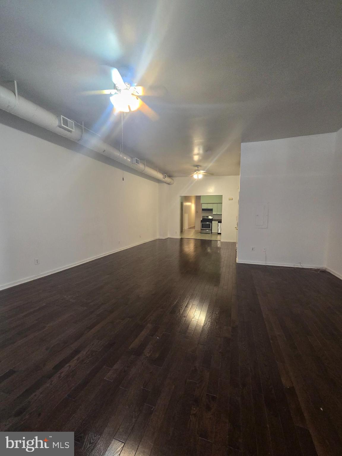 1304 Walnut Street, Unit 2 Philadelphia, PA 19107 - Photo 10 of 33 a view of a livingroom with wooden floor