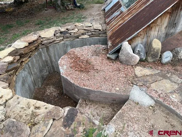 a room with furniture and a mirror
