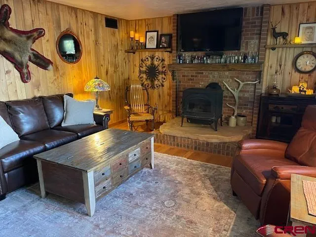 a kitchen with a refrigerator and a stove
