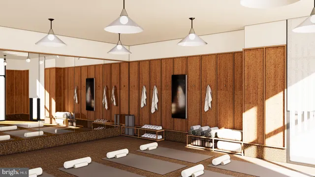 a dining room with table and chairs