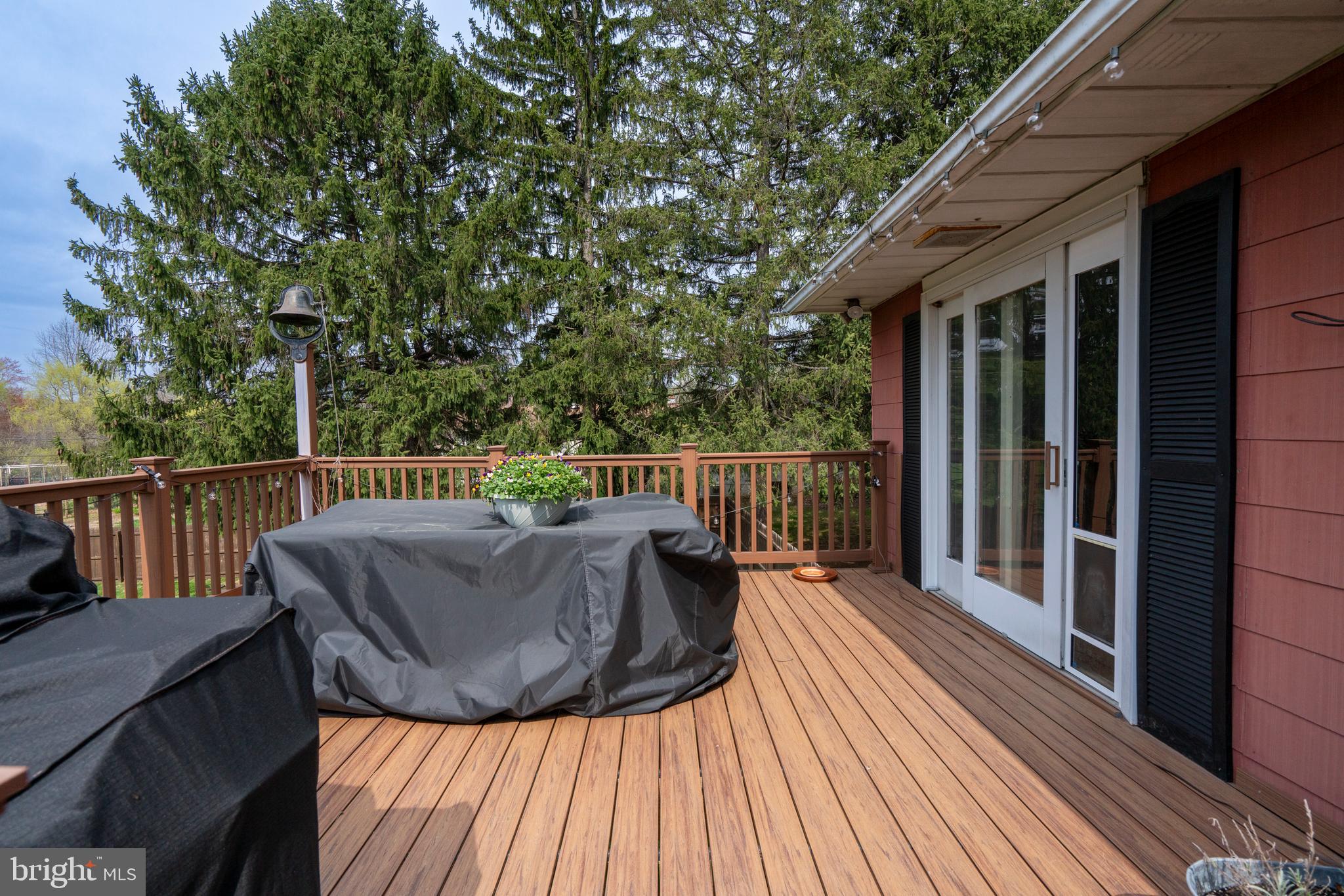 1066 Almshouse Road Ivyland, PA 18974 - Photo 17 of 39 a view of balcony with wooden floor and outdoor seating