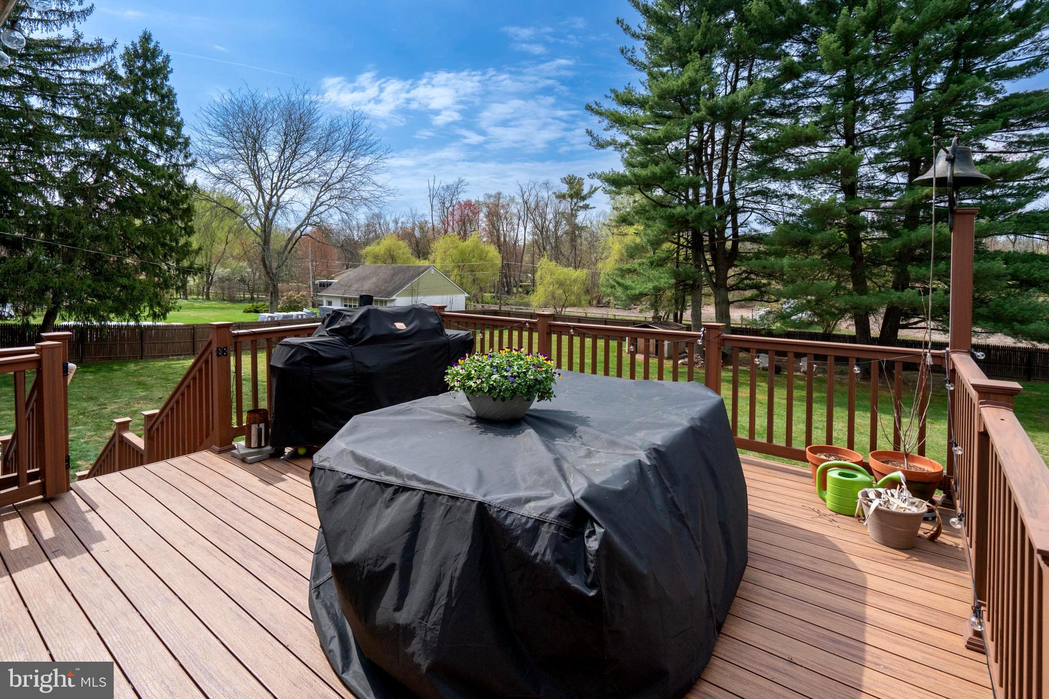1066 Almshouse Road Ivyland, PA 18974 - Photo 18 of 39 a view of a deck with wooden floor and outdoor seating