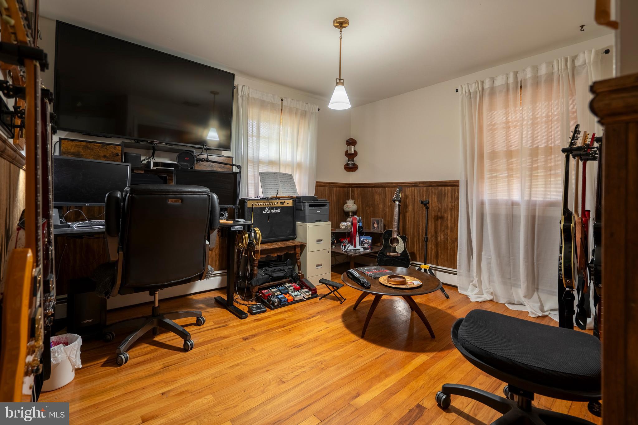 1066 Almshouse Road Ivyland, PA 18974 - Photo 20 of 39 a view of a workspace with furniture and gym equipment