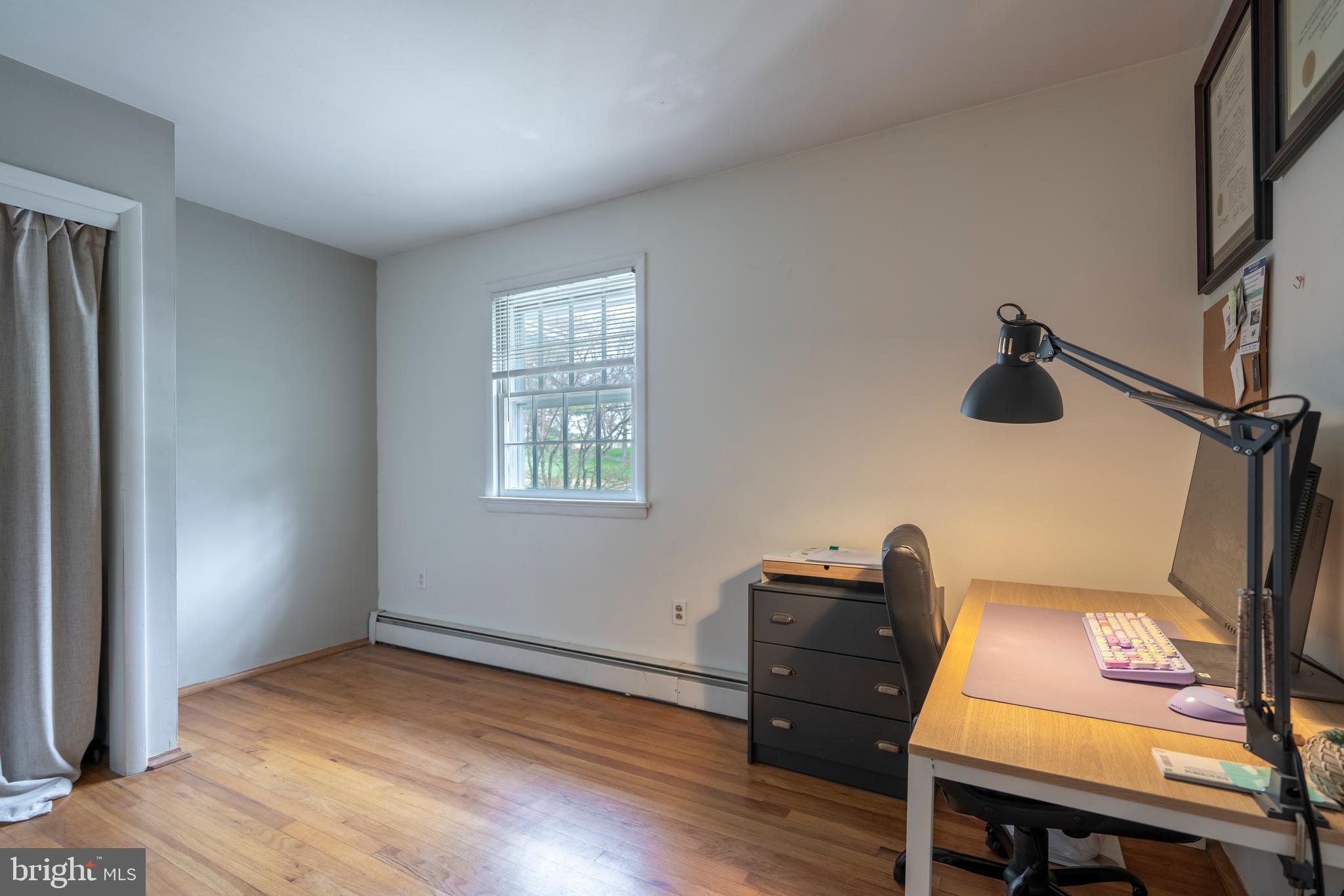 1066 Almshouse Road Ivyland, PA 18974 - Photo 21 of 39 a view of a workspace with furniture and a window