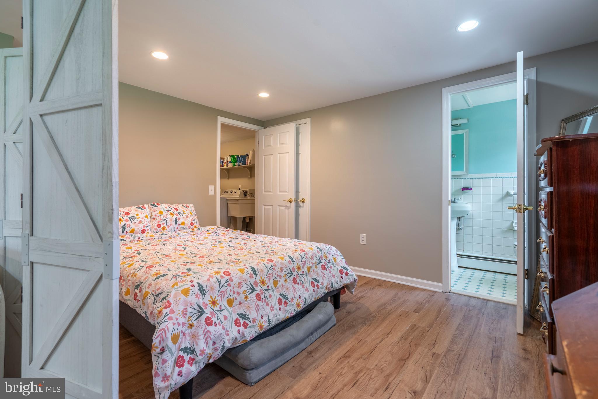 1066 Almshouse Road Ivyland, PA 18974 - Photo 29 of 39 a bedroom with a bed and a dresser