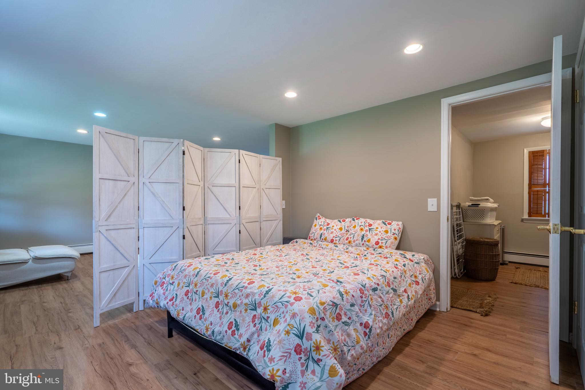 1066 Almshouse Road Ivyland, PA 18974 - Photo 30 of 39 a bedroom with a bed and a view of bathroom