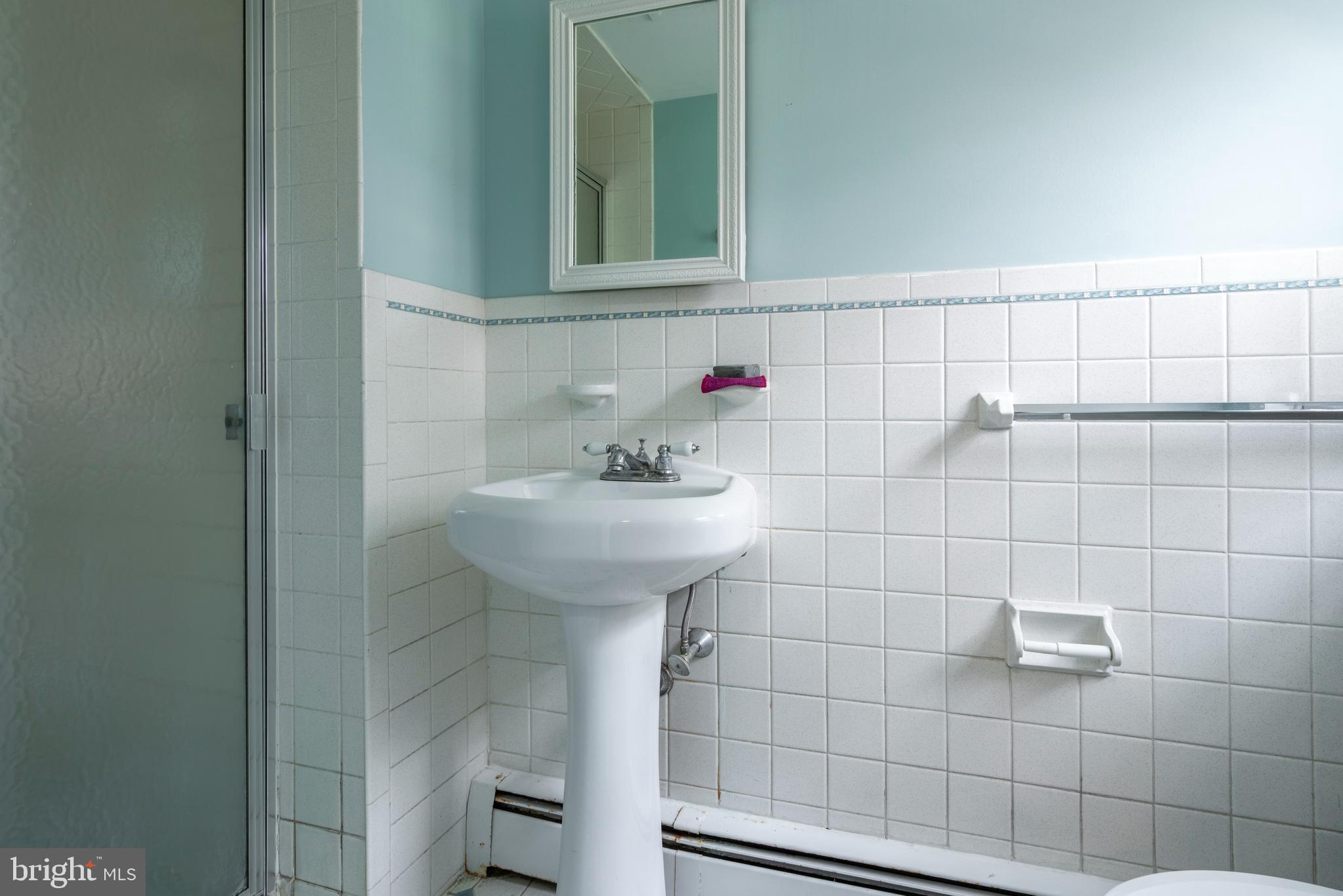 1066 Almshouse Road Ivyland, PA 18974 - Photo 31 of 39 a bathroom with a sink