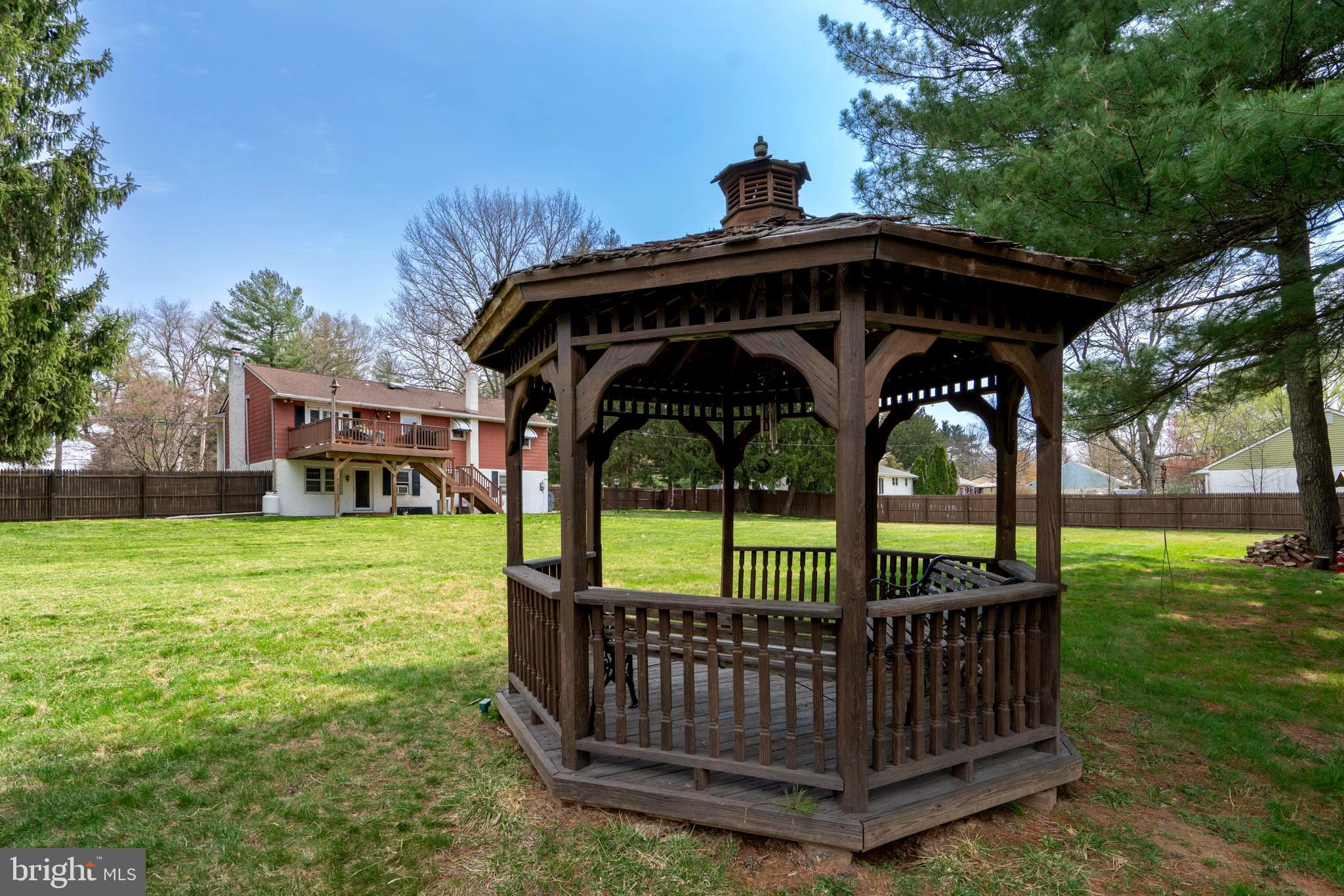 1066 Almshouse Road Ivyland, PA 18974 - Photo 39 of 39 a view of backyard with deck and garden