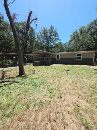 a parking space with wooden fence