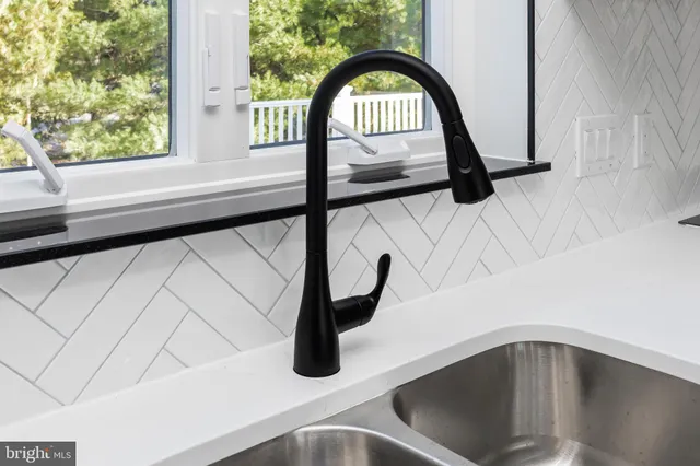 a bathroom with a toilet sink and a shower