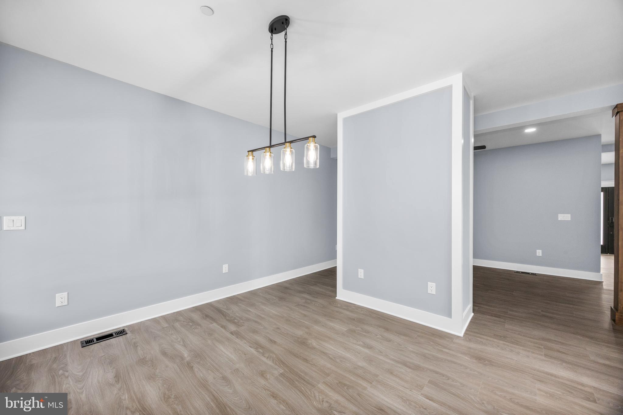 5692 King Stuart Drive Salisbury, MD 21801 - Photo 24 of 82 a view of empty room with wooden floor and fan