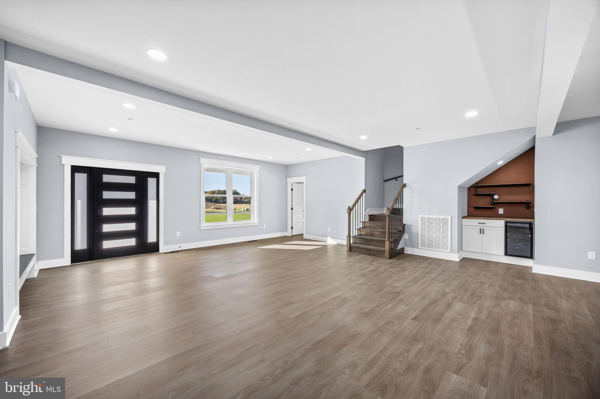 5692 King Stuart Drive Salisbury, MD 21801 - Photo 29 of 82 an empty room with wooden floor and closet