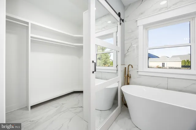 a view of a room with racks on the wall