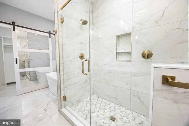 a view of a large house with a road