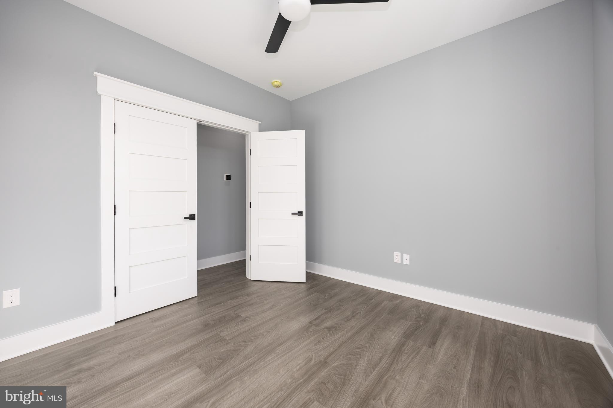 5692 King Stuart Drive Salisbury, MD 21801 - Photo 59 of 82 a view of an empty room with wooden floor